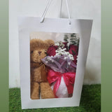 6 red roses bouquet in gift bag with teddy bear