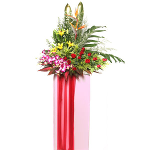 Yellow lilies, red roses, purple orchids and heliconia grand opening congratulatory flowers