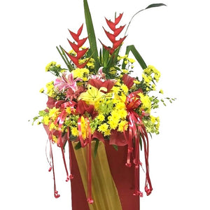 Yellow chrysanthemum, pink lilies, yellow lilies and heliconia grand opening congratulatory flowers