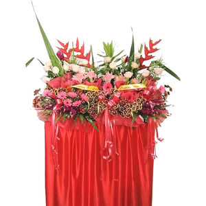 Pink gerbera, peach roses, ginger flower and heliconia grand opening congratulatory flowers