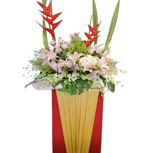 Pink lilies, pink roses, white orchids and heliconia grand opening congratulatory flowers