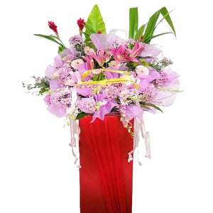 Pink lilies, pink gerbera, purple orchids, purple chrysanthemum and ginger flower grand opening congratulatory flowers