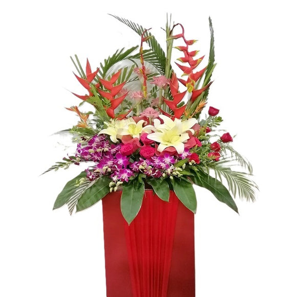 White lilies, purple orchids, red roses, ginger flower and heliconia grand opening congratulatory flowers