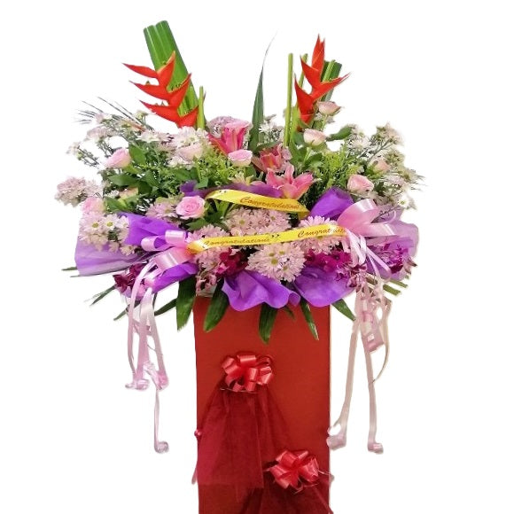 Pink lilies, pink roses, purple chrysanthemum, purple orchids and heliconia grand opening congratulatory flowers