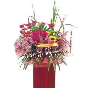 Sunflowers, pink roses, purple chrysanthemum and heliconia grand opening congratulatory flowers