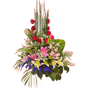 Red roses, mixed pink and white lilies table flower arrangement