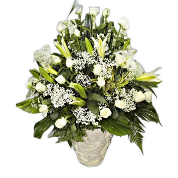 White roses and white lilies table flower arrangement