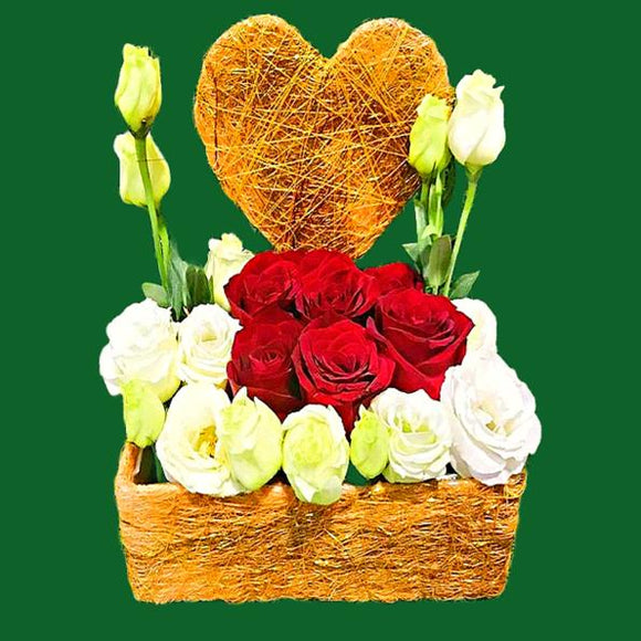 Red roses and white eustoma table flower arrangement