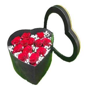 12 red roses and baby's breath in black heart-shaped gift box table flower arrangement