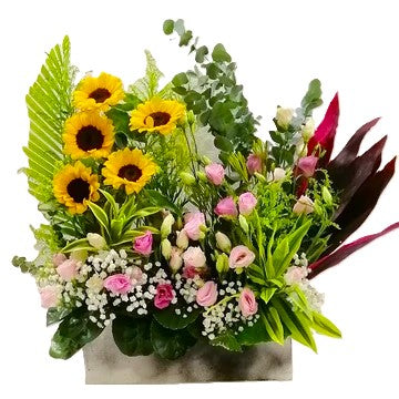 Sunflowers and pink eustoma table flower arrangement
