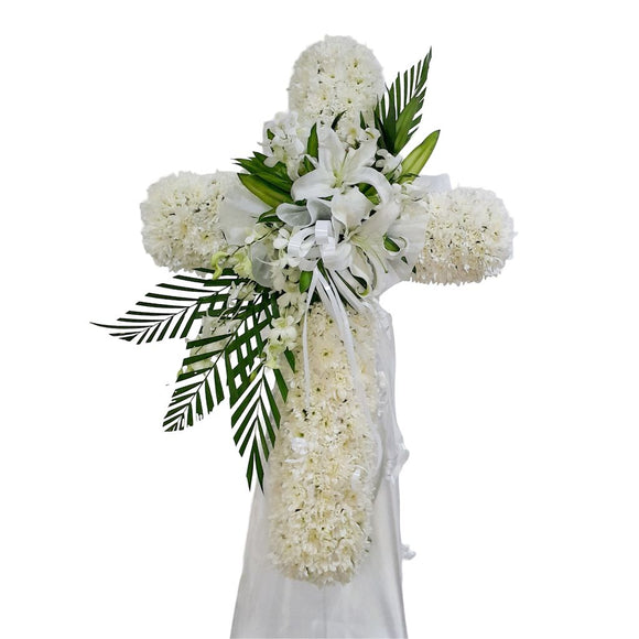 White lilies and white chrysanthemum cross wreath