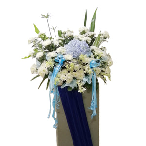 Blue hydrangea and white chrysanthemum flowers wreath