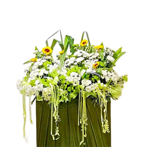 Sunflowers, white lilies and white chrysanthemum flowers wreath