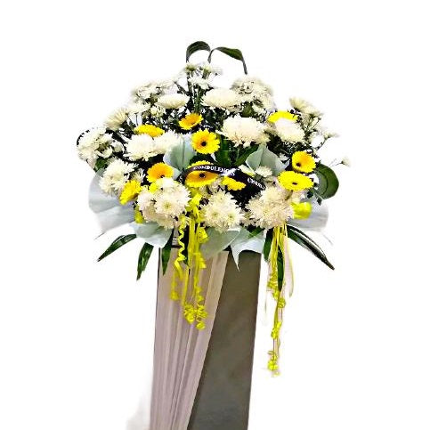 Yellow gerberas and white chrysanthemum flowers wreath