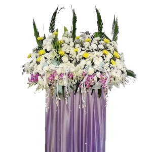 Purple orchids, yellow and white chrysanthemum flowers wreath