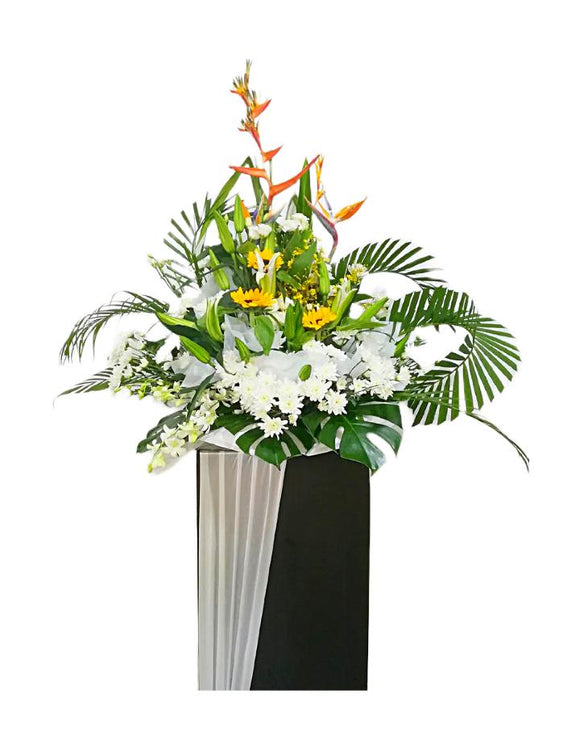 Sunflowers, white lilies, white orchids and white chrysanthemum flowers wreath