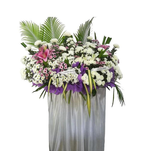 White and pink lilies, purple and white chrysanthemum flowers wreath