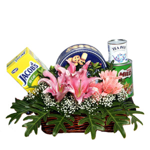 Get well gift hamper with biscuits, cookies, milo, creamer and pink flowers