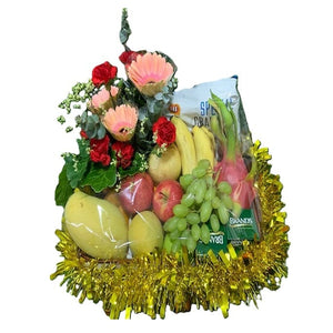 Get well floral fruit gift hamper with flowers, snacks and Brands essence of chicken