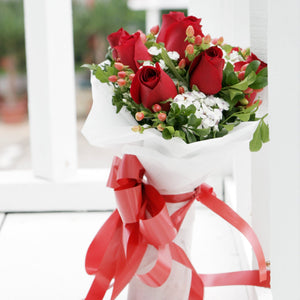 8 red roses with hypericum berries bouquet