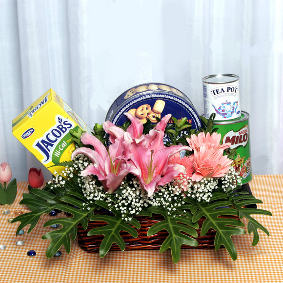 A gift hamper wellness basket with healthy food and flowers by Katong Flower Shop for singapore delivery. 